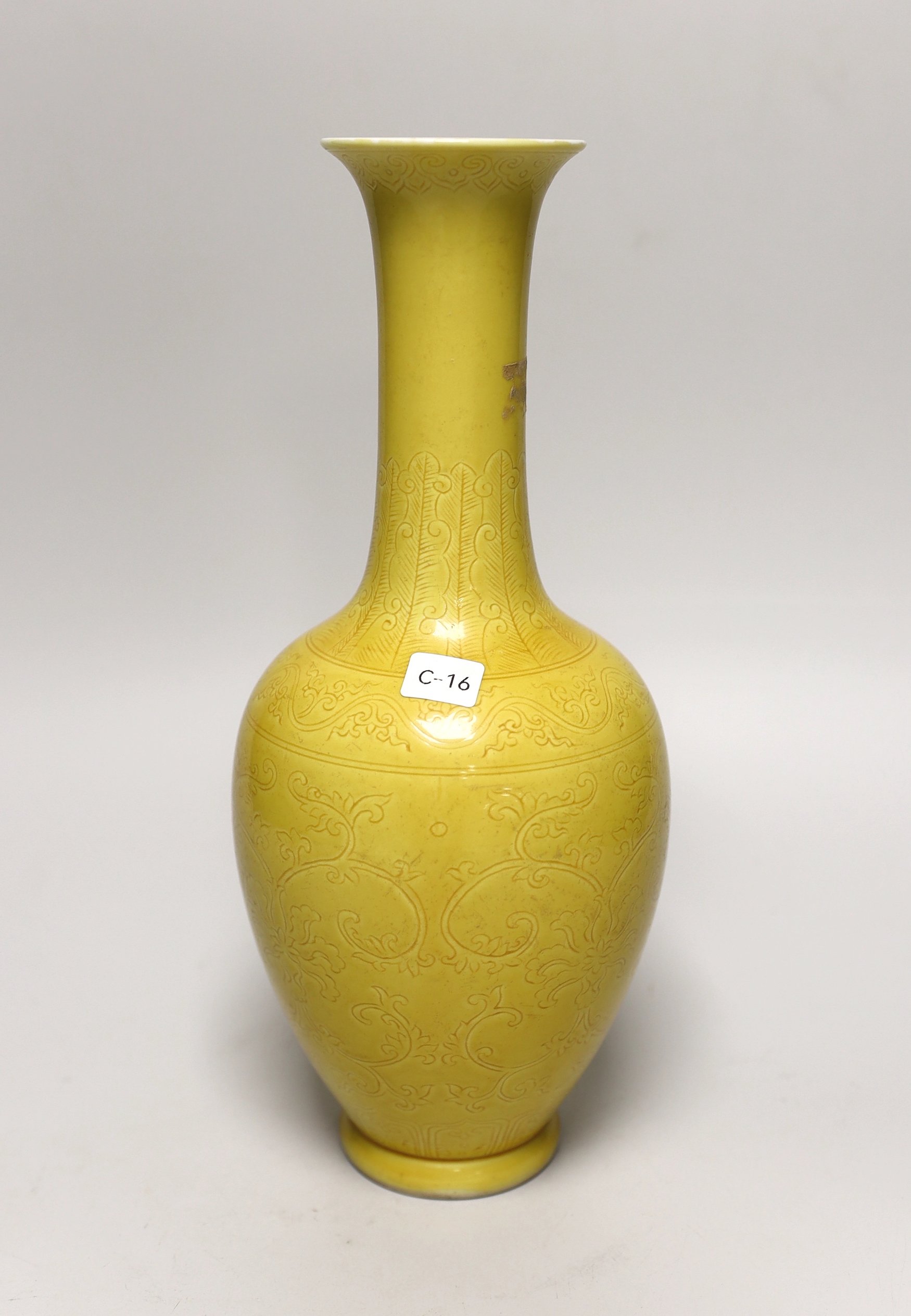 A Chinese yellow ground vase with incised detail, 30cm